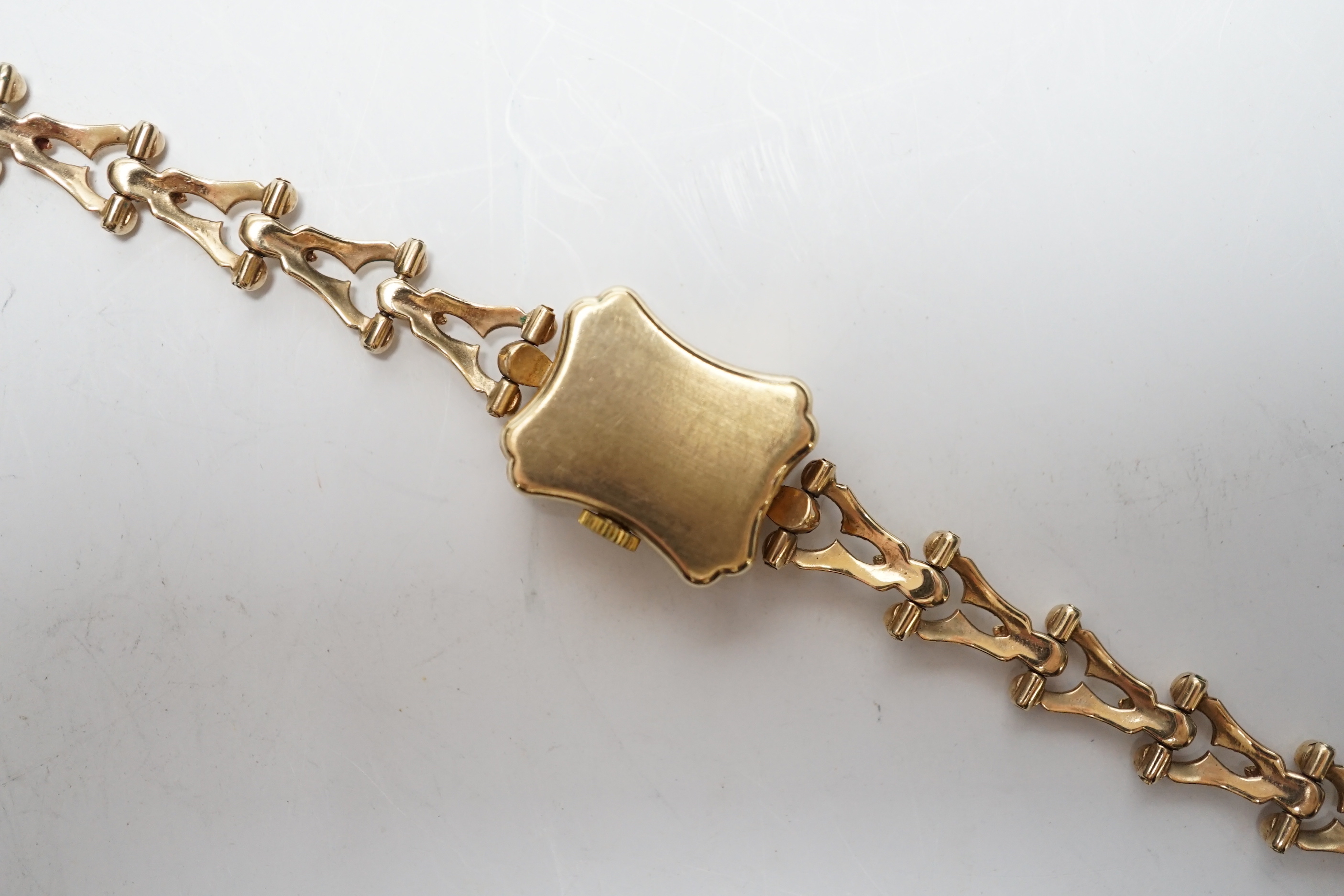 A lady's late 1960's 9ct gold Tudor Royal manual wind wrist watch, on an associated 9ct gold bracelet, overall 18cm, gross weight 18.6 grams.